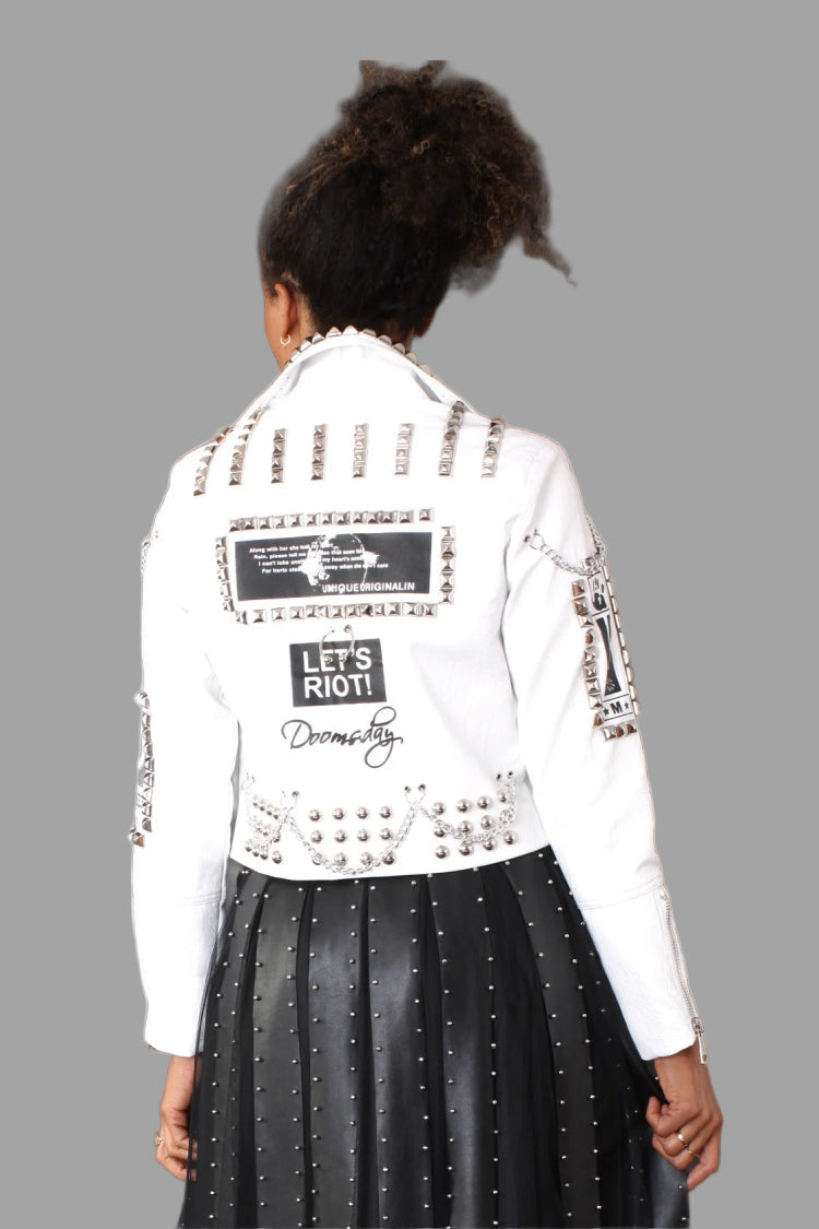 White studded leather moto jacket showing back view with graphic text print and edgy moto styling, For Her NYC