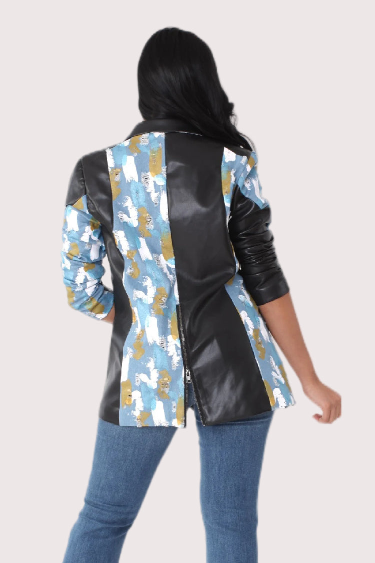Abstract print leather blazer in denim and black featuring bold mixed textures and sleek faux leather paneling, back view, For Her NYC