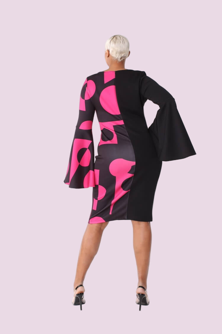 Color block bell sleeve dress style 82062 in black and pink shown front-facing in a standing pose highlighting the bold color block design by For Her NYC
