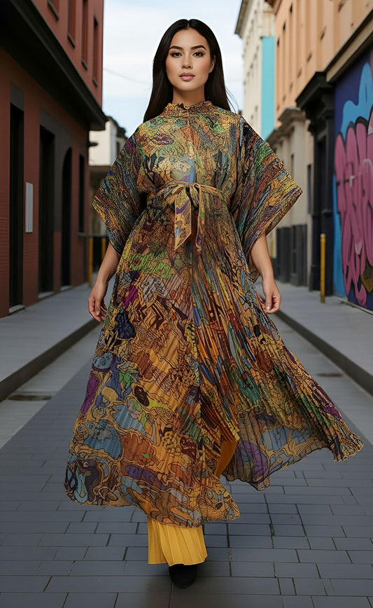 82930 mustard/multi Model wearing Pleated Pantset with abstract print and golden pleated pants, styled in an urban street setting by For Her NYC.