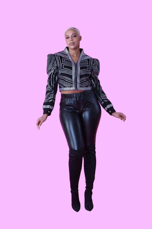 Black cropped jacket with rhinestone detailing shown in a front full-length pose, featuring geometric rhinestone patterns, structured shoulders, and a zip-up front, statement outerwear piece by For Her NYC