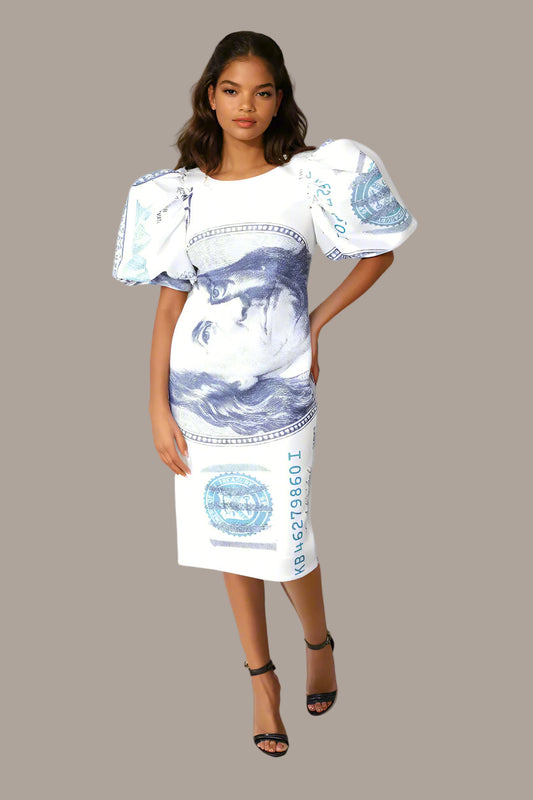 Model wearing dollar print scuba midi dress with bold puff sleeves in a trendy fashion look.