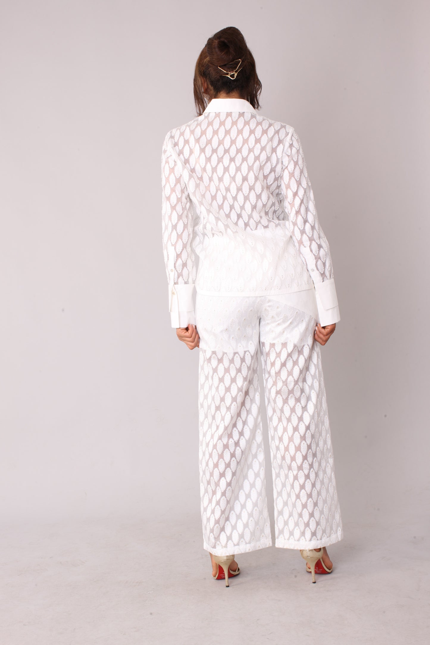 White eyelet tulle top with feather pattern shown from the back highlighting sheer texture and fit, For Her NYC