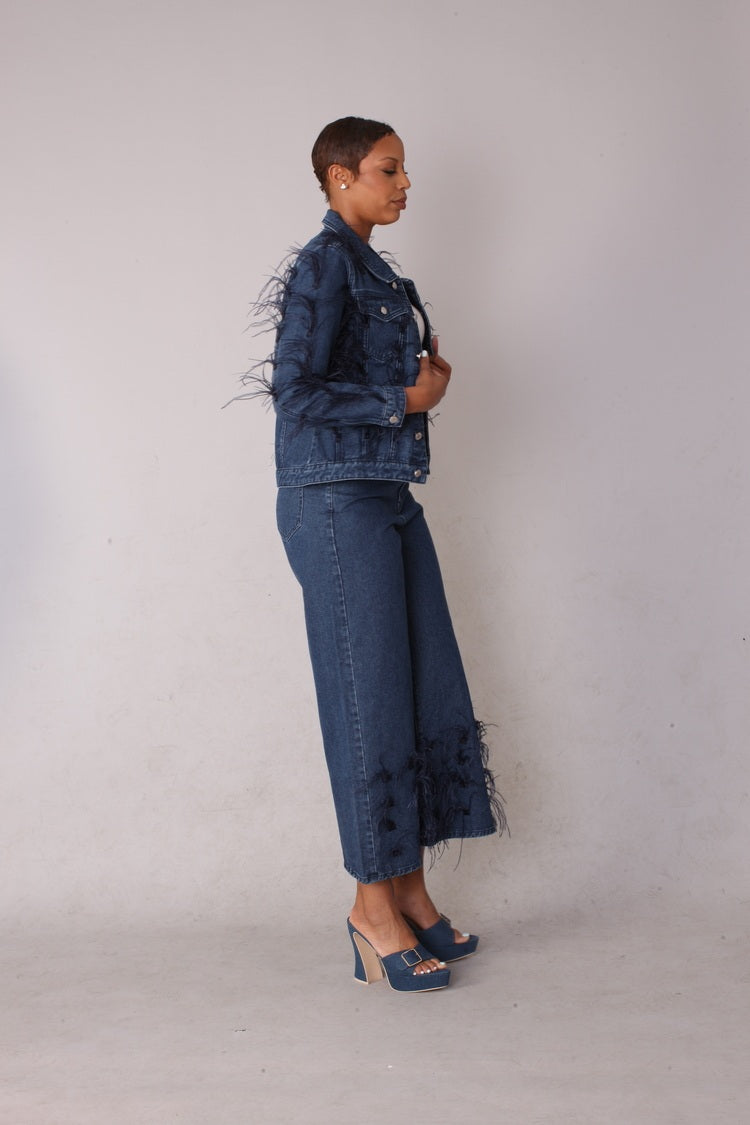 Blue feather trim wide leg jeans shown in side profile emphasizing silhouette and movement, For Her NYC