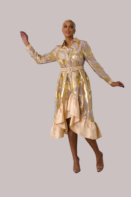 Model wearing gold metallic organza dress walking forward showing movement and shine. For Her NYC.