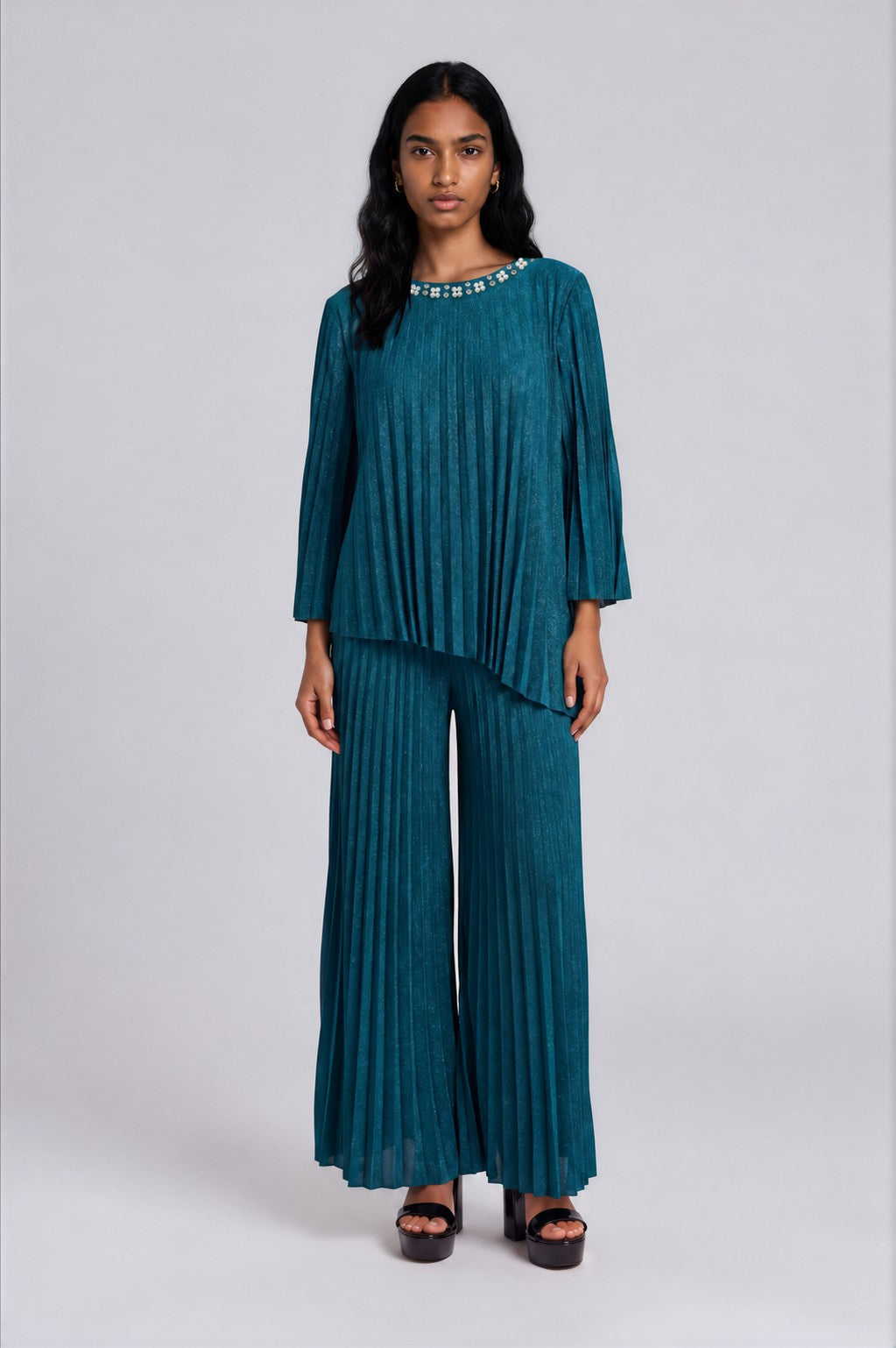 Front view of a model wearing the green For Her NYC Pleated Top and Wide-Leg Pant Set - 83449