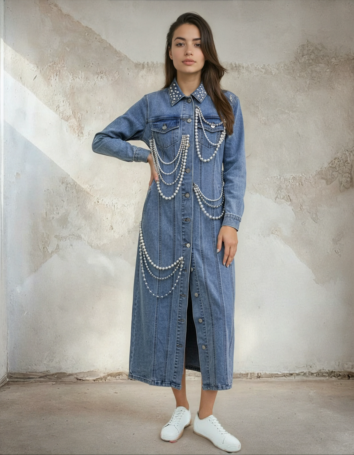 Full view of pearl-embellished denim dress styled with bold chain accents and relaxed silhouette by For Her NYC.