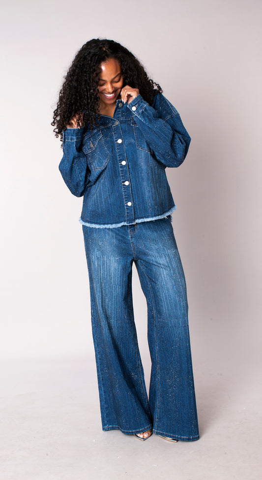 Denim blue glitter-effect flared denim pants, model standing front in matching denim top, For Her NYC