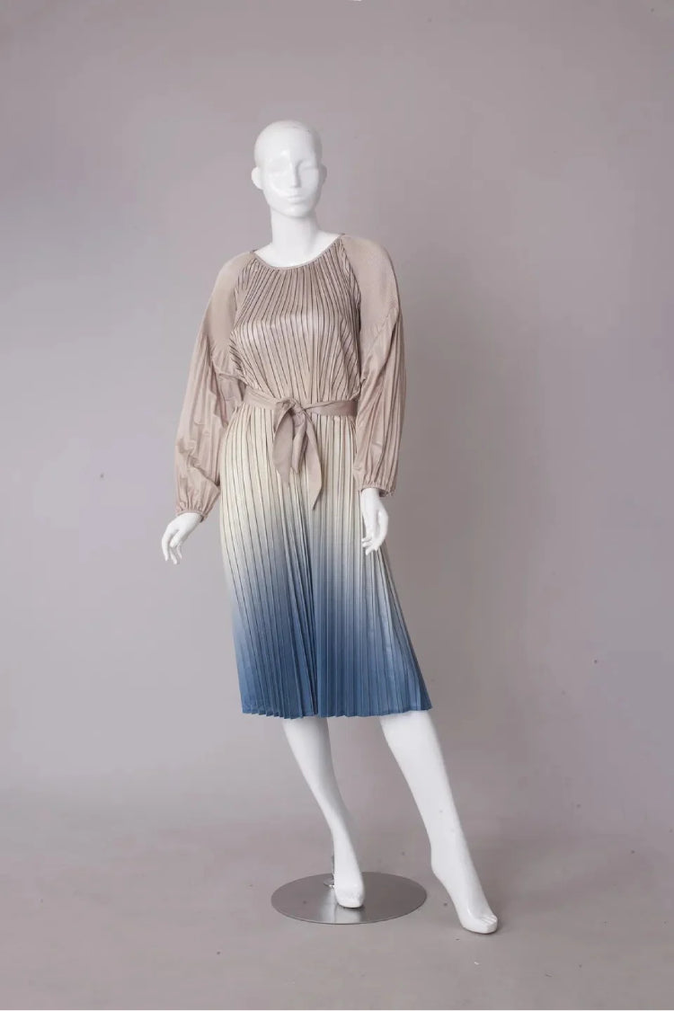 Front View: Gradient pleated midi dress in neutral to blue ombré, long sleeve — For Her NYC
