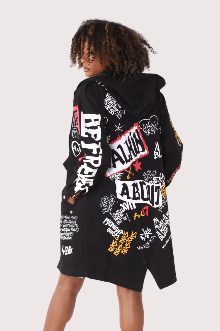 Black graffiti print oversized jacket back view featuring bold graphic prints and hood for edgy street style.