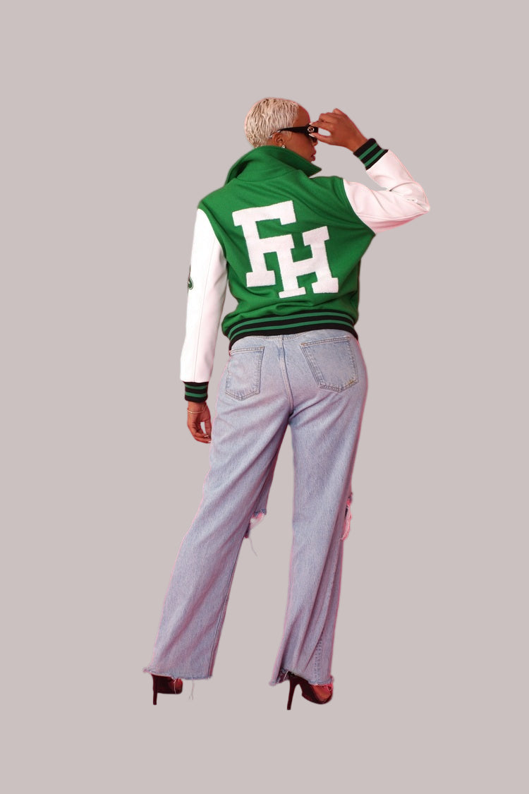 Back view green varsity jacket featuring oversized FH embroidery – For Her NYC