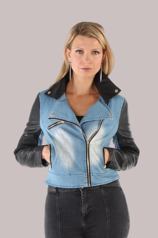 Black denim leather moto jacket with asymmetric zipper detail and sleek mixed material design, worn front view — For Her NYC.