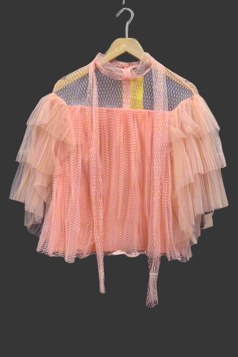 Pink blush mesh blouse displayed on hanger with delicate layered ruffles – For Her NYC