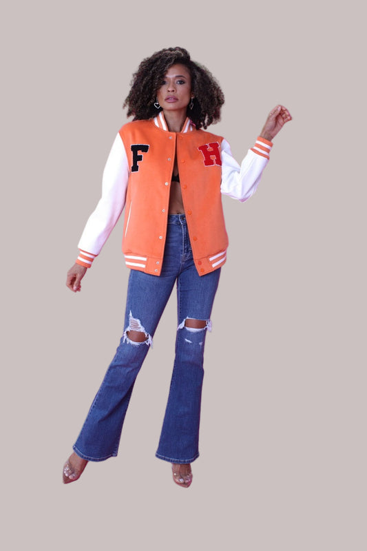 Front view of orange varsity jacket with white sleeves and large F patch – For Her NYC