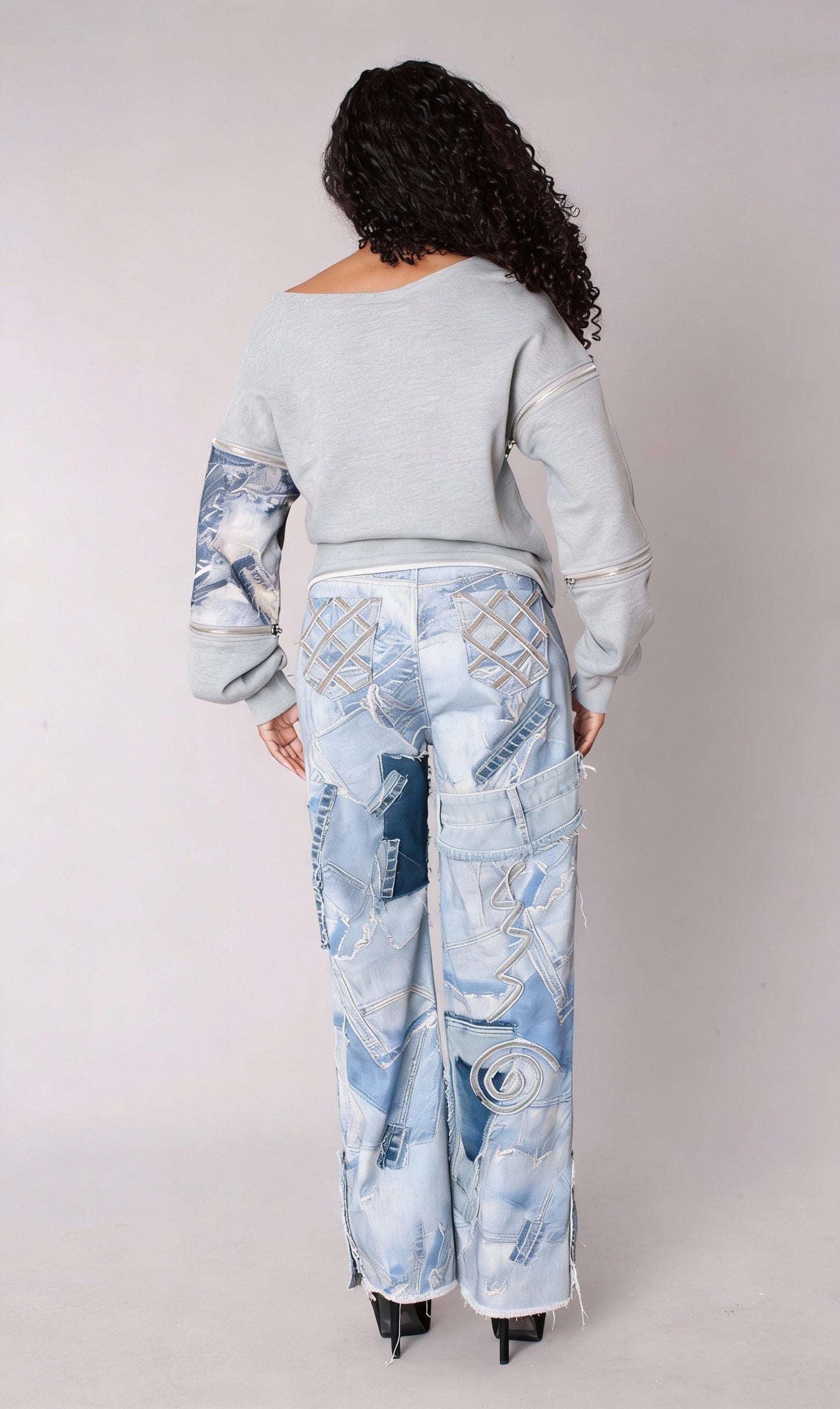 Light wash patchwork distressed straight-leg denim jeans, back view showing panel details, For Her NYC