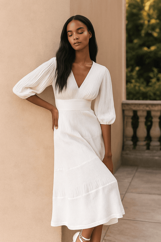 Model wearing white romantic tiered maxi dress with balloon sleeves