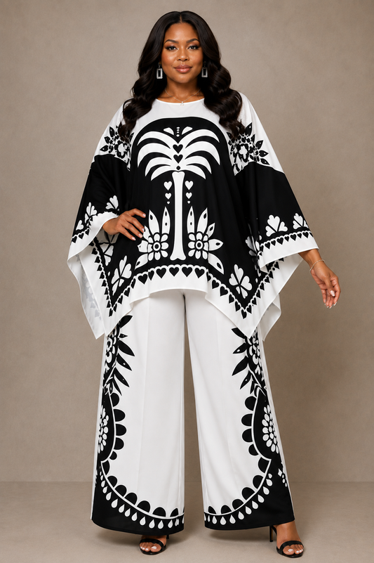 For Her NYC Plus Size Black & White Maxi Tunic Pant Set featuring a bold monochrome print, flowing maxi tunic with wide sleeves, coordinating wide-leg pants, and a flattering relaxed two-piece silhouette.