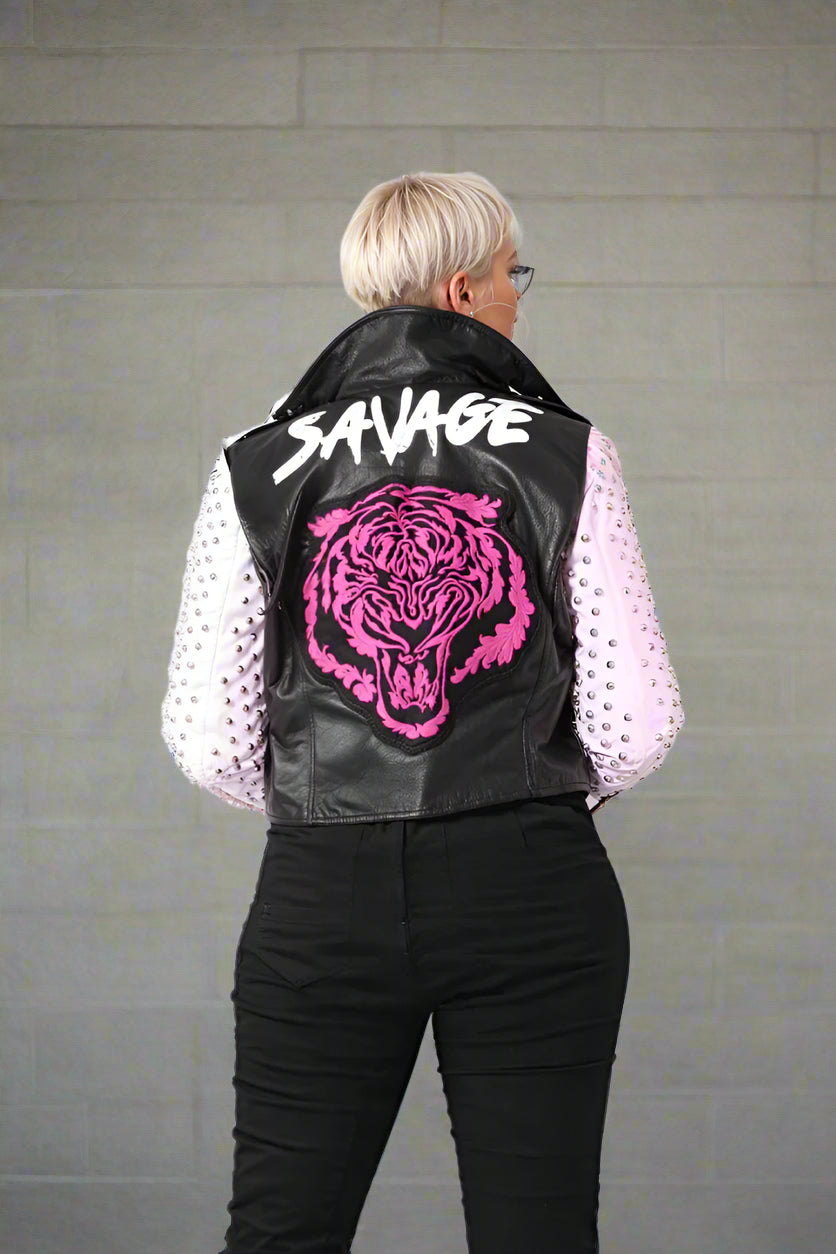 Black and pink studded faux leather moto jacket showing back view with embroidered tiger graphic, For Her NYC