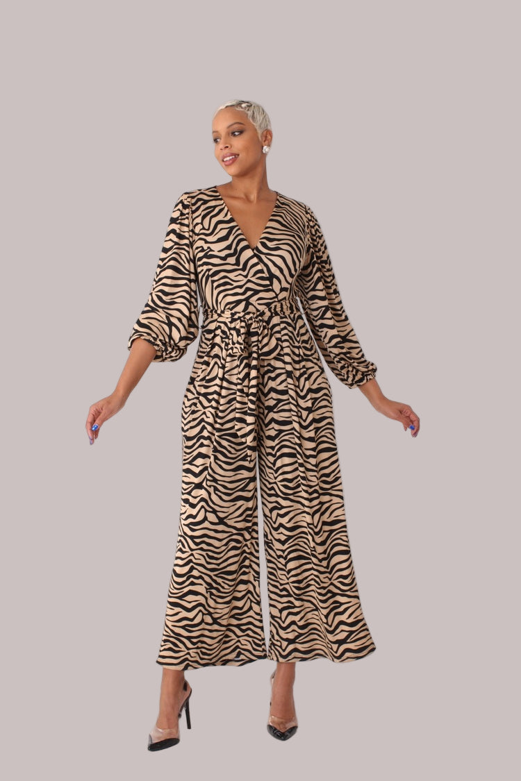 Model wearing coffee and black wide-leg jumpsuit with puff sleeves standing front-facing by For Her NYC