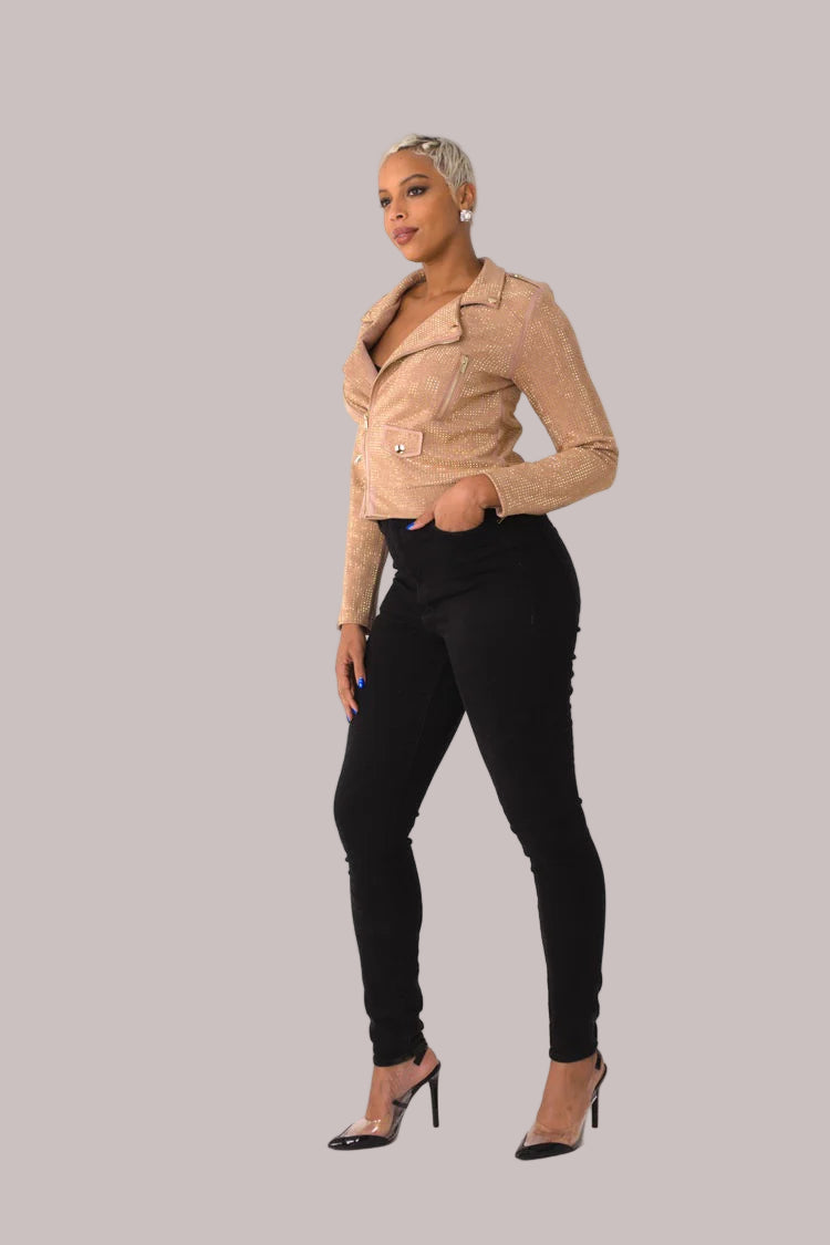 Nude faux suede moto jacket with allover diamond embellishments style 82022 shown in a side standing pose highlighting the cropped moto cut by For Her NYC