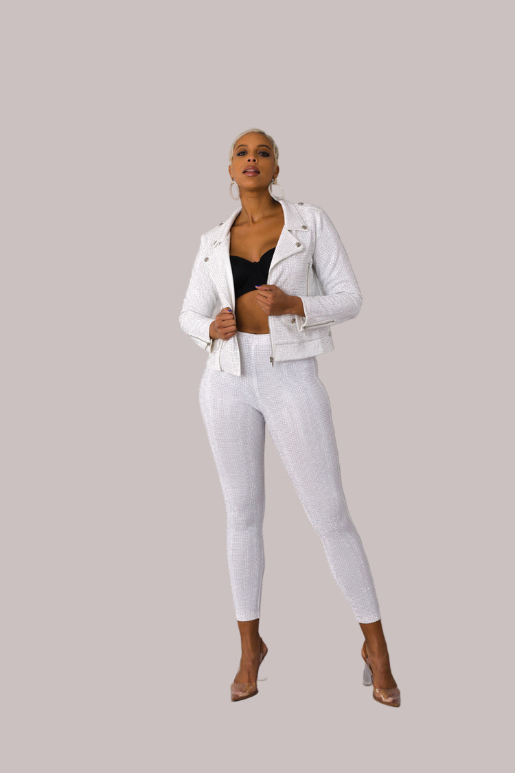 White faux suede moto jacket with allover diamond embellishments style 82022 shown front-facing in a standing pose with a sleek fitted silhouette by For Her NYC