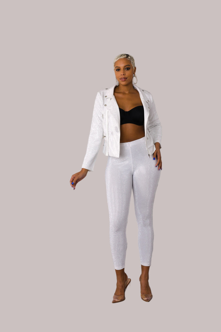 White faux suede moto jacket with allover diamond embellishments style 82022 shown in a three-quarter standing pose emphasizing moto detailing by For Her NYC