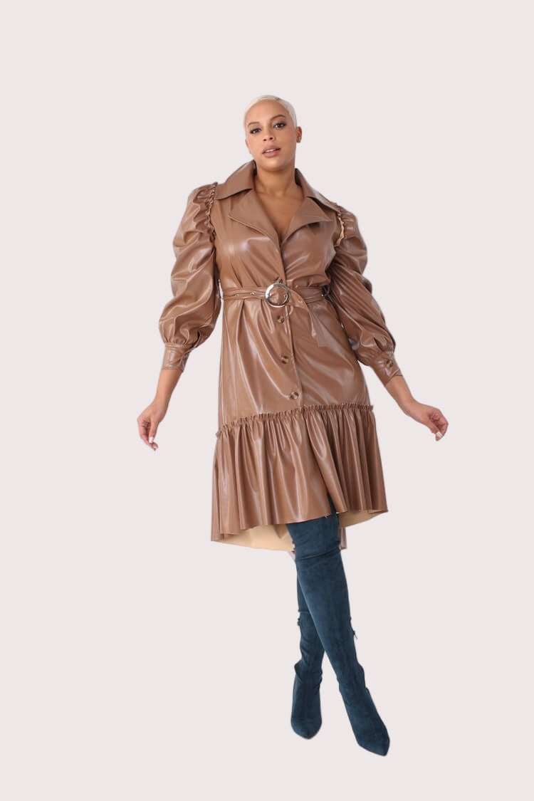 Alt text: Model walking forward in the Leather High-Low Ruffle Midi Dress, capturing motion of the ruffled high-low hem – For Her NYC