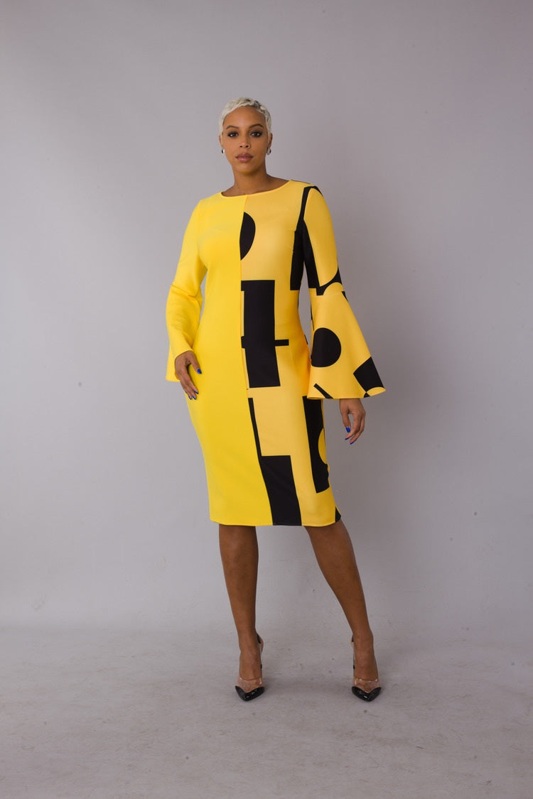 Color block bell sleeve dress style 82062 in yellow and black shown in a full-body standing pose emphasizing the silhouette and contrast design by For Her NYC