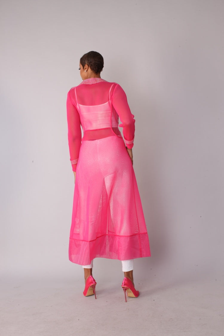 Pink rhinestone mesh duster jacket style 82213 shown from the back in a standing pose highlighting the full-length drape and rhinestone detailing by For Her NYC