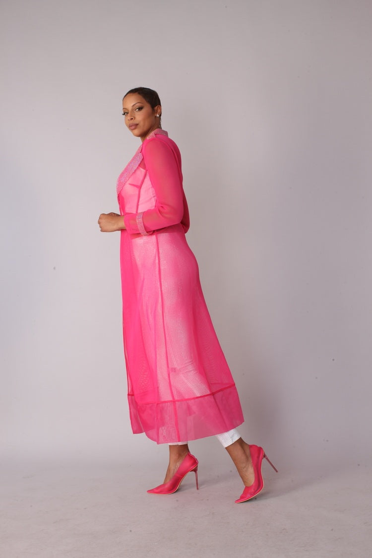Pink rhinestone mesh duster jacket style 82213 shown in a side standing pose emphasizing the translucent mesh fabric and elegant length by For Her NYC