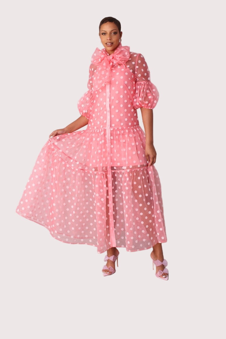 Polka dot organza maxi dress style 82234 in coral and white shown front-facing in a standing pose highlighting the vibrant color and vintage-inspired design by For Her NYC