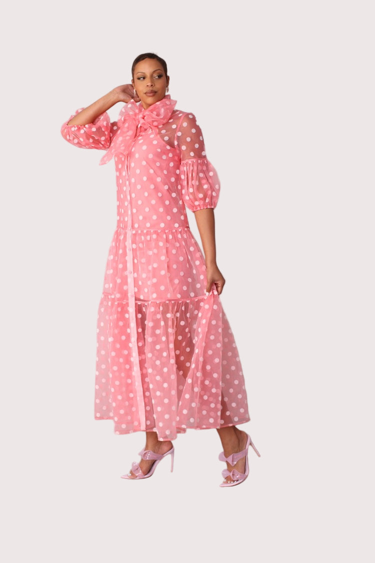 Polka dot organza maxi dress style 82234 in coral and white shown front-facing in a standing pose highlighting the vibrant color and vintage-inspired design by For Her NYC