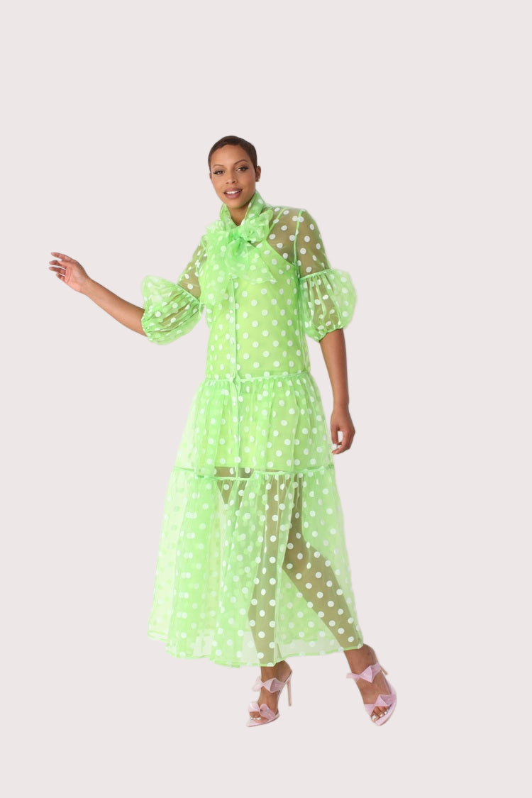 Polka dot organza maxi dress style 82234 in lime and white shown with arm movement highlighting sleeve shape and lightweight organza fabric by For Her NYC