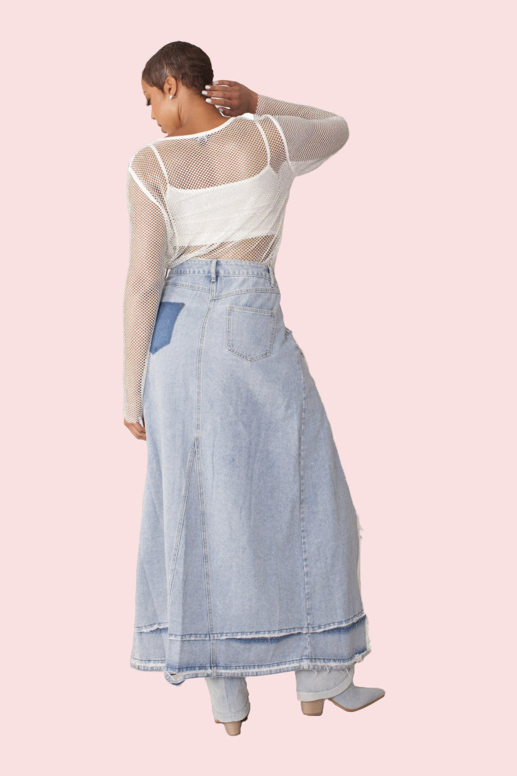 Crystal mesh long sleeve top style 82249 in white shown from the back in a standing pose highlighting the sheer mesh fabric, rhinestone detailing, and layered styling over a camisole by For Her NYC