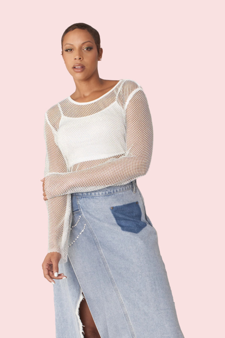 Crystal mesh long sleeve top style 82249 in white shown front-facing in a standing pose highlighting the sheer mesh fabric and allover rhinestone detail by For Her NYC