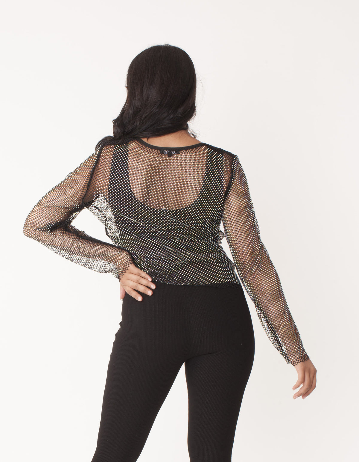 82249-black back view of model wearing a black open-knit long-sleeve top, For Her NYC