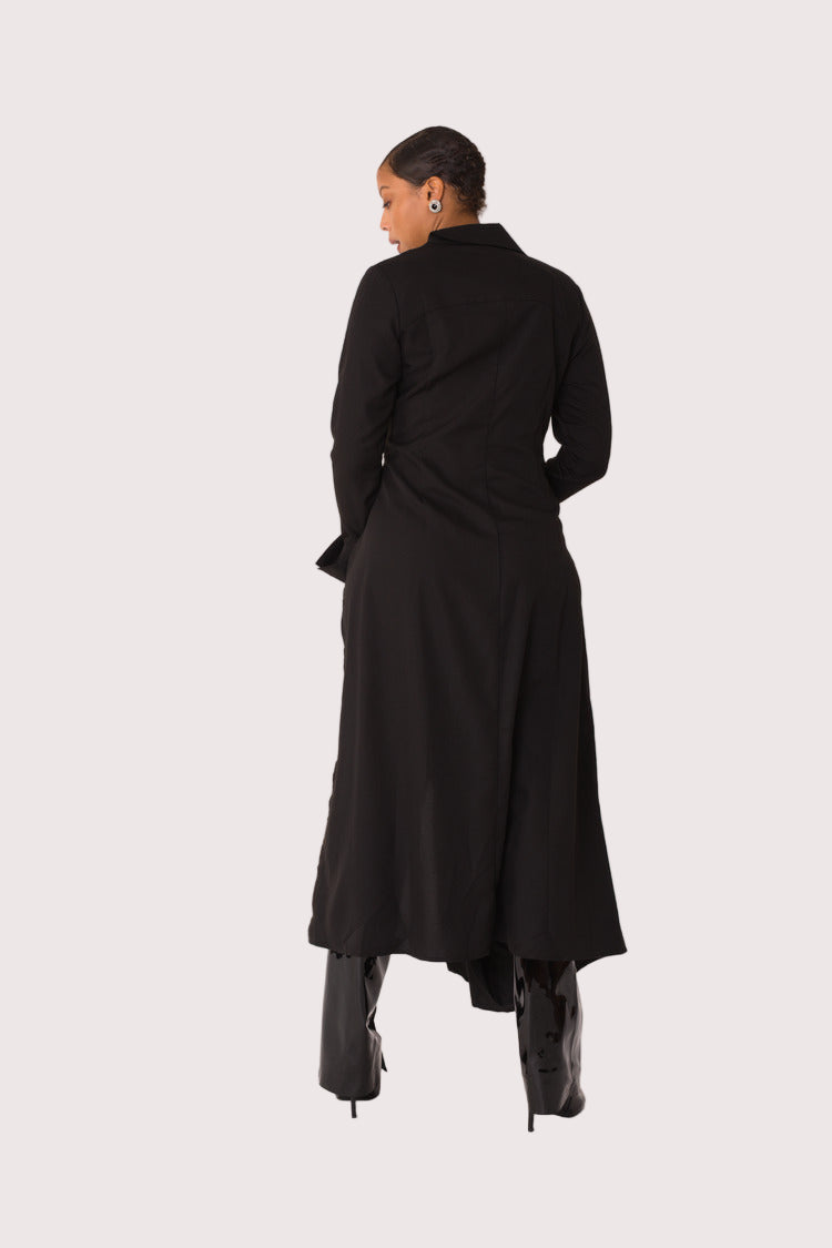 Champagne Dreams maxi dress style 82336 in black multi shown from the back in a standing pose displaying the full-length silhouette and relaxed fit by For Her NYC