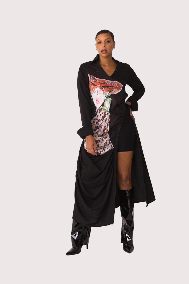 Champagne Dreams maxi dress style 82336 in black multi shown from the front in a standing pose highlighting the graphic champagne bottle print and dramatic silhouette by For Her NYC