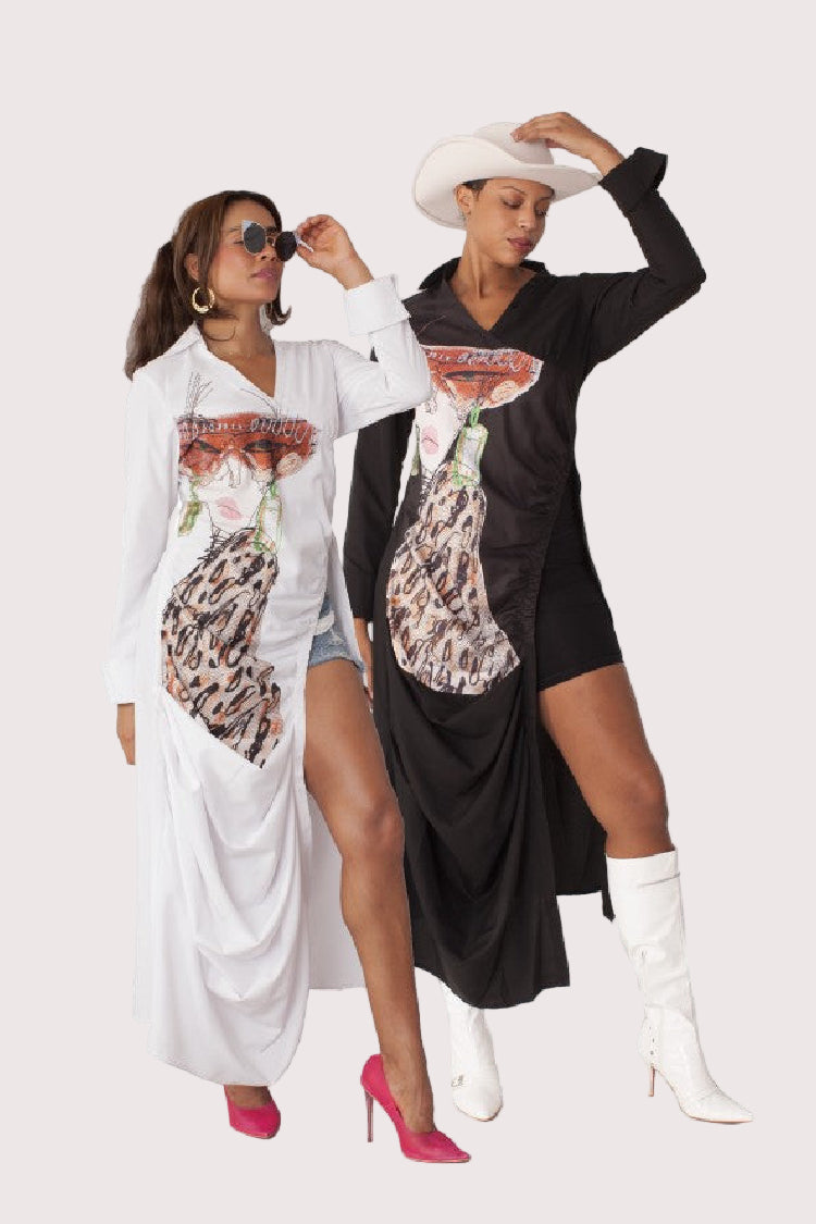 Champagne Dreams maxi dress style 82336 in white multi shown in a fashion-forward standing pose highlighting the conversation-print design and fluid movement by For Her NYC