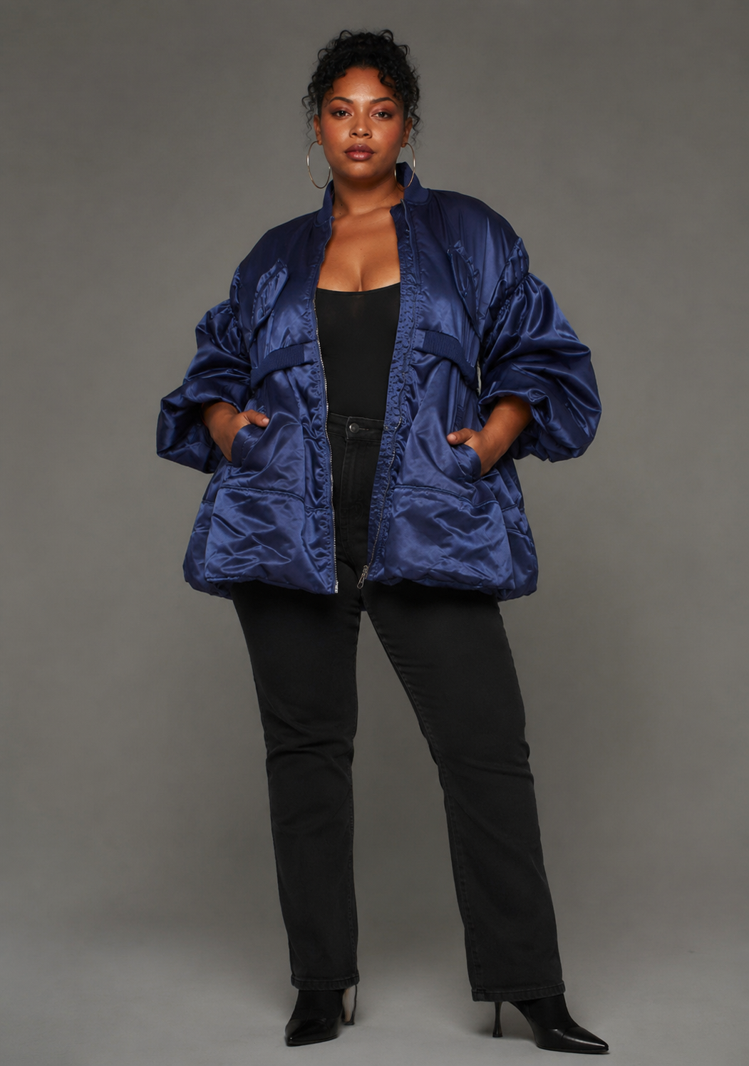 navy/silver woven jacket with contrasting lining paired with black pants and black ankle boots, standing front pose – For Her NYC