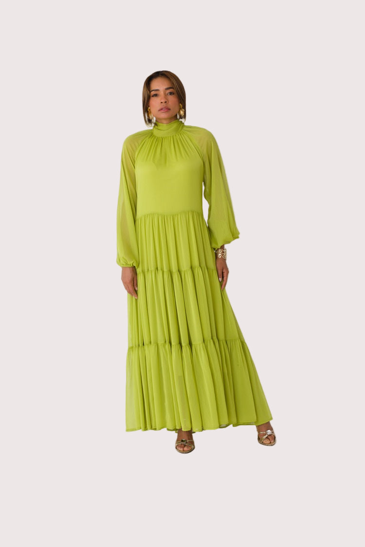 Chartreuse Dream tiered maxi dress style 82348 in lemon grass shown from the front in a standing pose highlighting the flowing chiffon fabric and tiered silhouette by For Her NYC