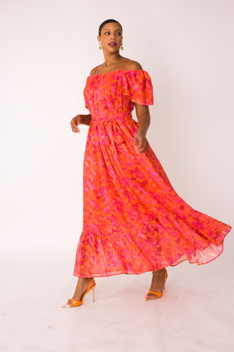 Sunset Bloom maxi dress style 82376 in multi print captured in a twirl motion showcasing the dramatic flow and lightweight fabric by For Her NYC