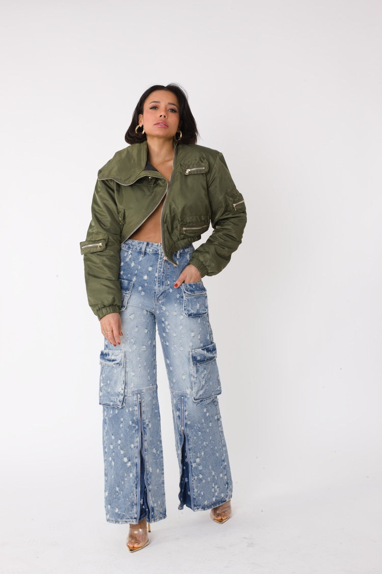 Model styling olive cropped utility bomber jacket with denim jeans, front view, For Her NYC
