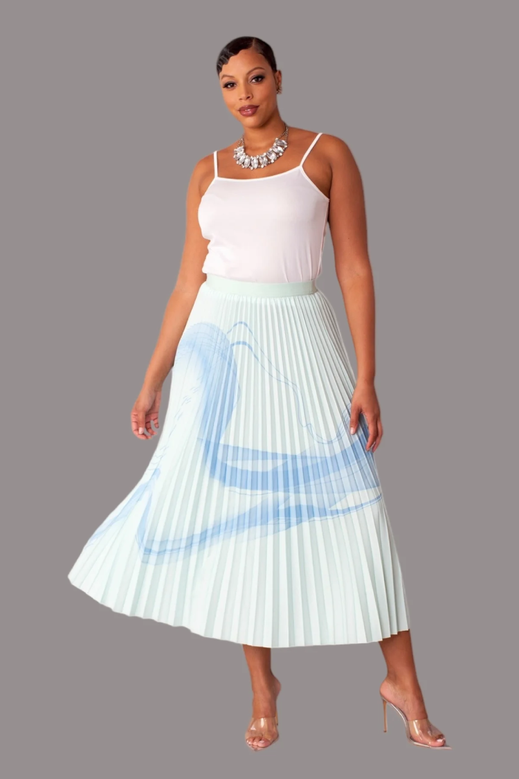 Watercolor print pleated maxi skirt in green multi, model standing front view, For Her NYC