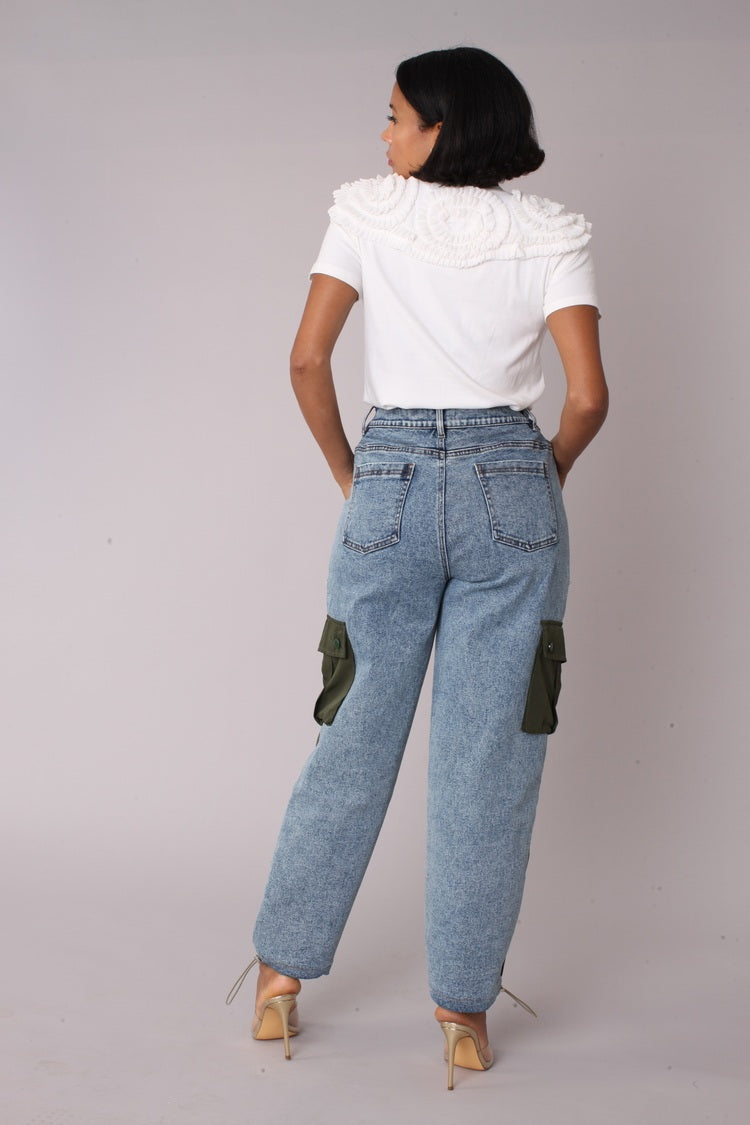 Olive denim hybrid cargo joggers shown in back view displaying cargo pocket placement by For Her NYC