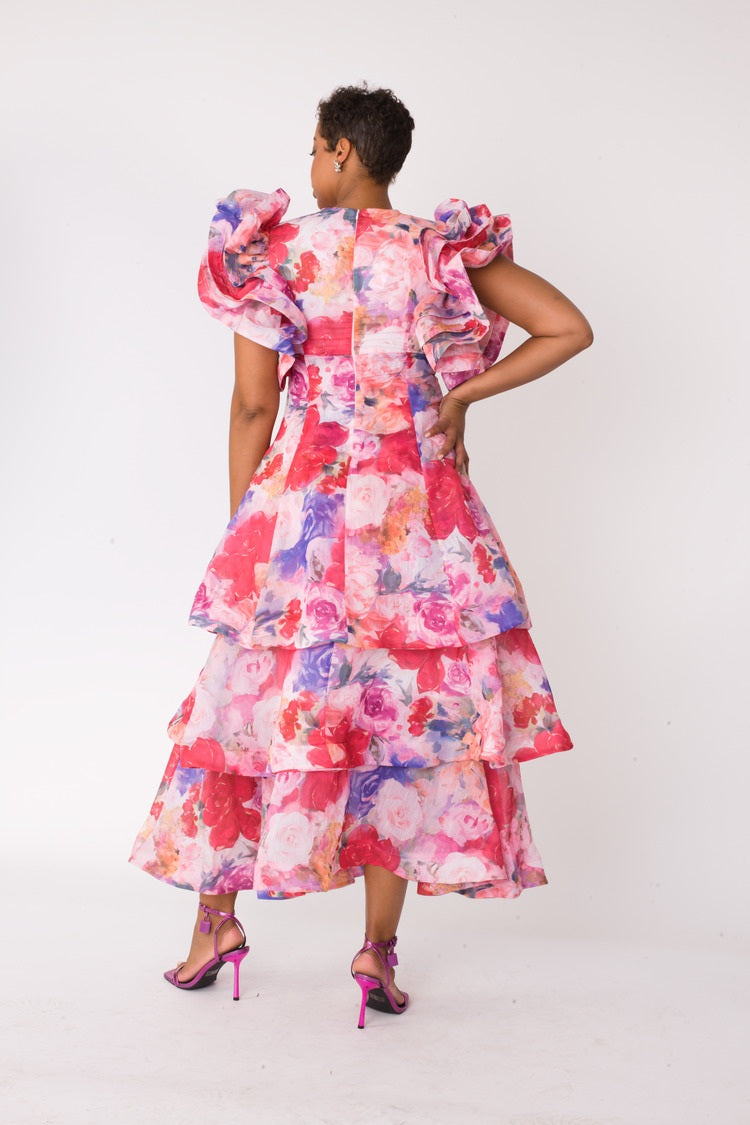 Watercolor floral tiered midi dress shown in back view displaying tiered construction by For Her NYC