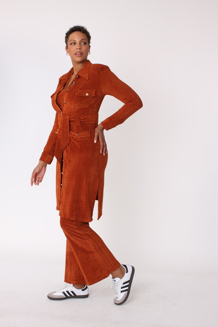 Brown luxe corduroy three piece set shown in walking forward pose with long coat by For Her NYC