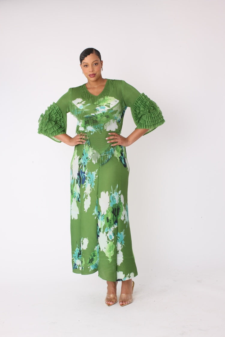 Floral print pleated midi dress in green multi with hands on hips front pose by For Her NYC