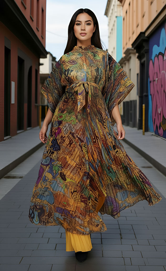 82930 mustard/multi Model wearing Pleated Pantset with abstract print and golden pleated pants, styled in an urban street setting by For Her NYC.