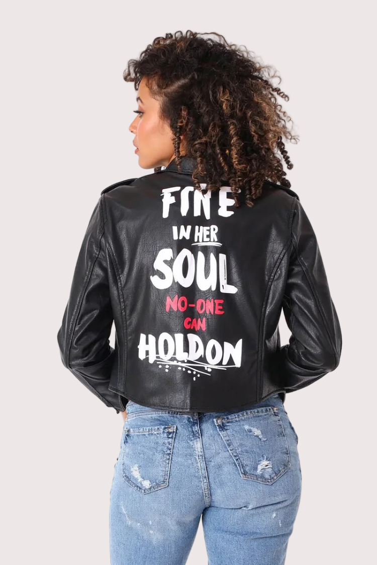 Black and lime vegan leather moto jacket showing back view with “Fire in Her Soul” graphic and statement design, For Her NYC